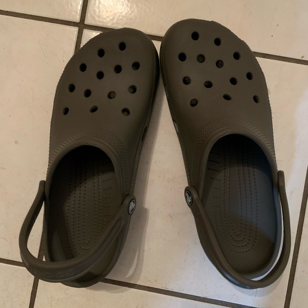 Men’s size 10, women’s size 12 dark grey crocs